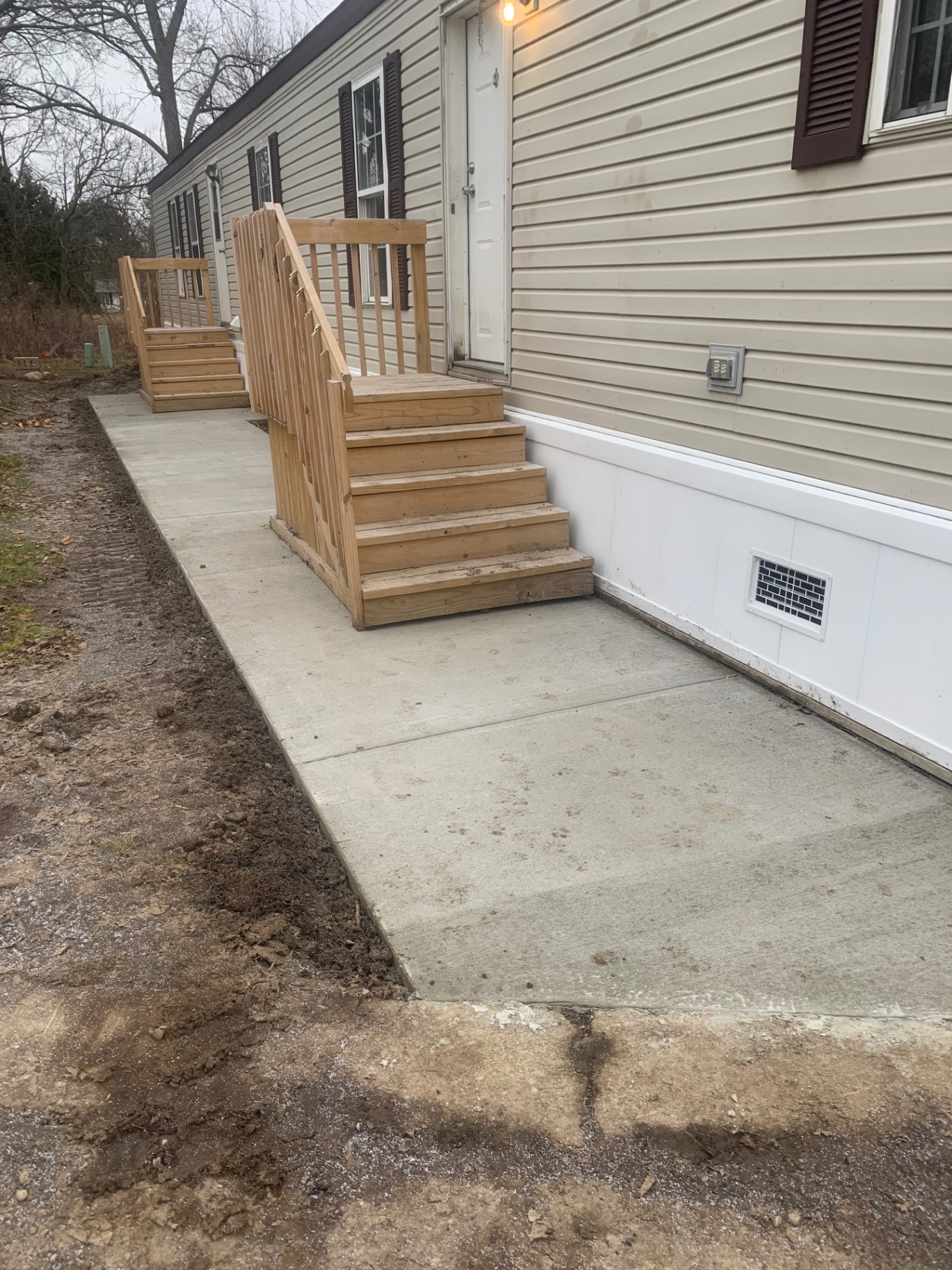 Newly poured concrete walkway and steps